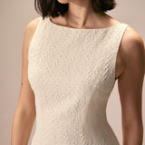 The Beige Boat Neck Textured Mini Dress