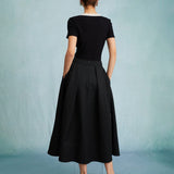 The Black High Waisted Pleated Midi Skirt